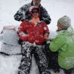 Noonan freezing during a snowy day during the wilderness first aid responder course