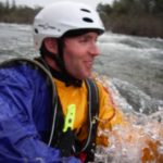 Tyler in the American River during an advanced swiftwater rescue training course