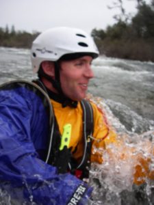 Tyler in the American River during an advanced swiftwater rescue training course