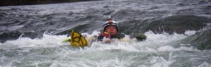 Jeff in a boil line in the american river during a swiftwater rescue training course